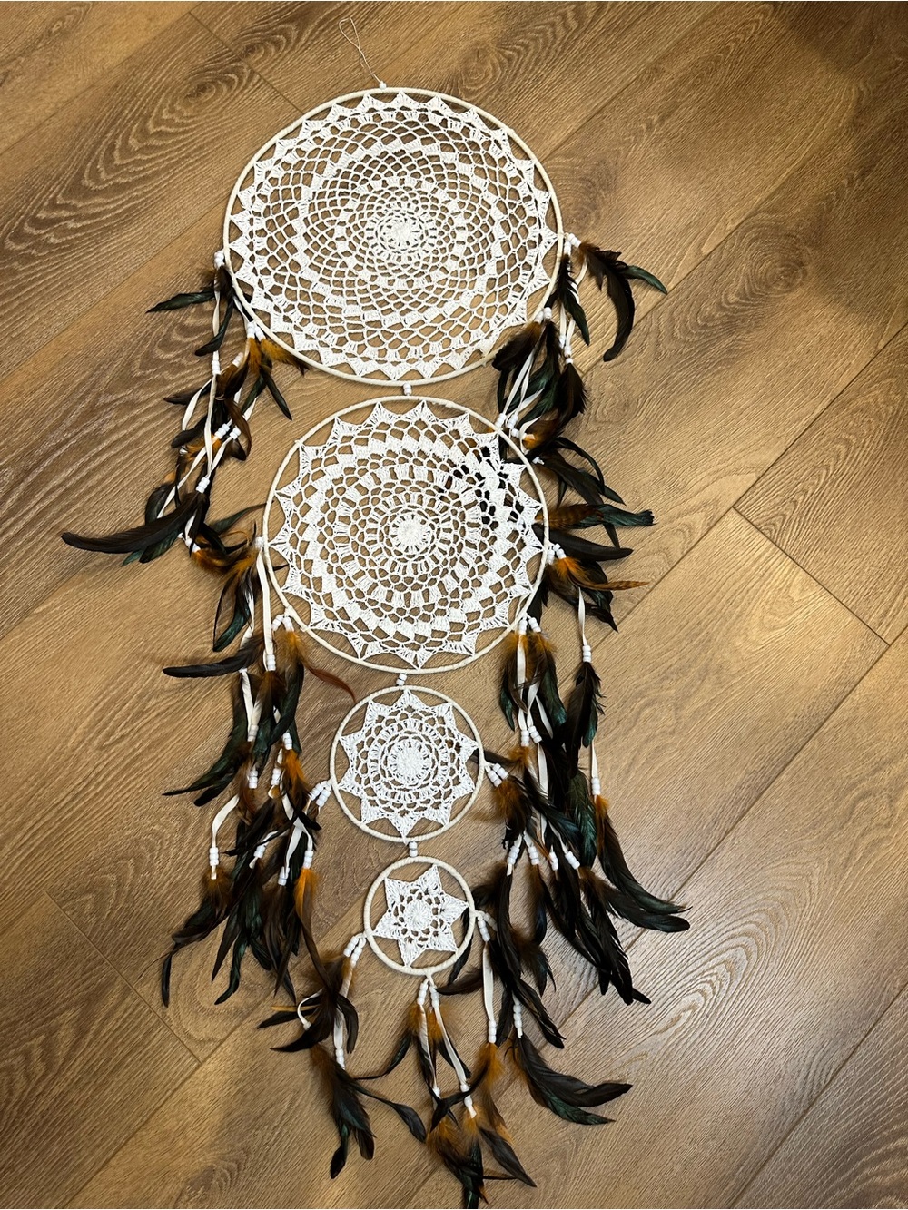 White Crochet Dreamcatcher Wall Hanging with Brown & Black Feathers